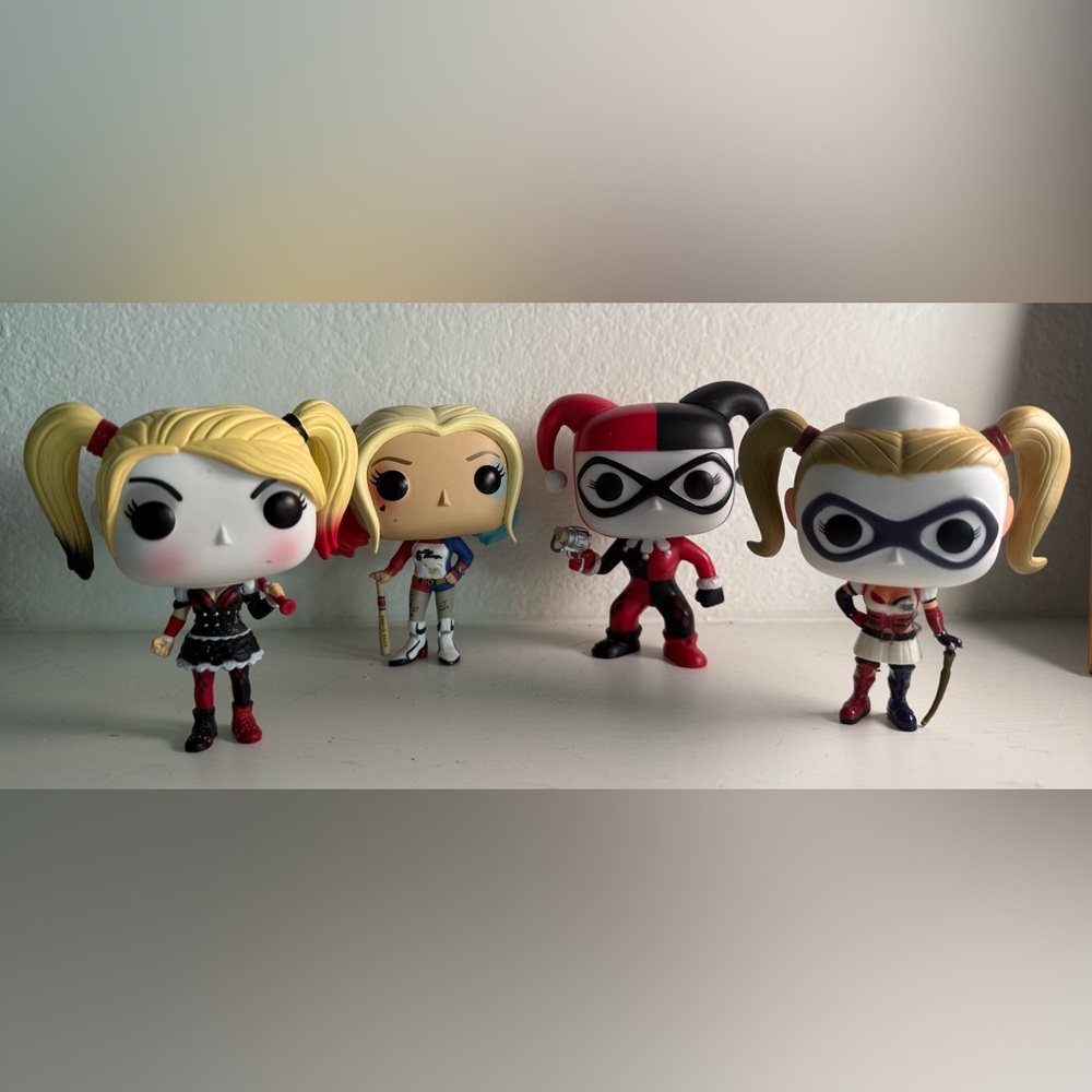 Four DC Comics Harley Quinn Funko Pop Figurines